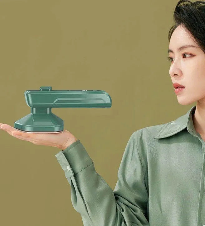 Dark green portable hanging ironing machine with ceramic panel and handheld design