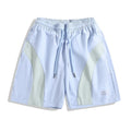 Men's quick-drying sports shorts in loose straight-leg style with elastic waistband