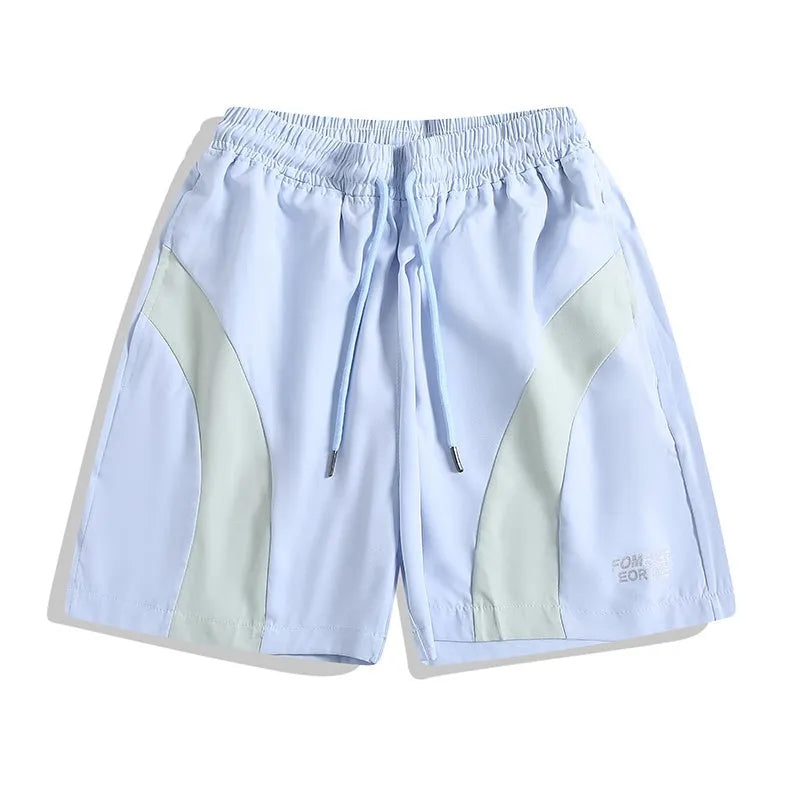 Men's quick-drying sports shorts in loose straight-leg style with elastic waistband