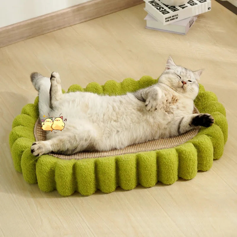 Green oval cat scratch pad bowl with sisal scratching surface measuring 650x420mm