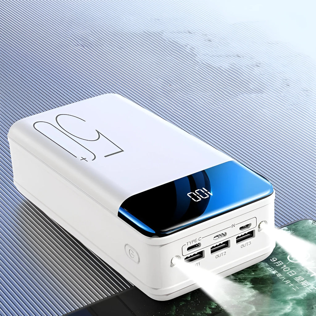 Large 50000mAh power bank with three USB ports in black or white plastic case