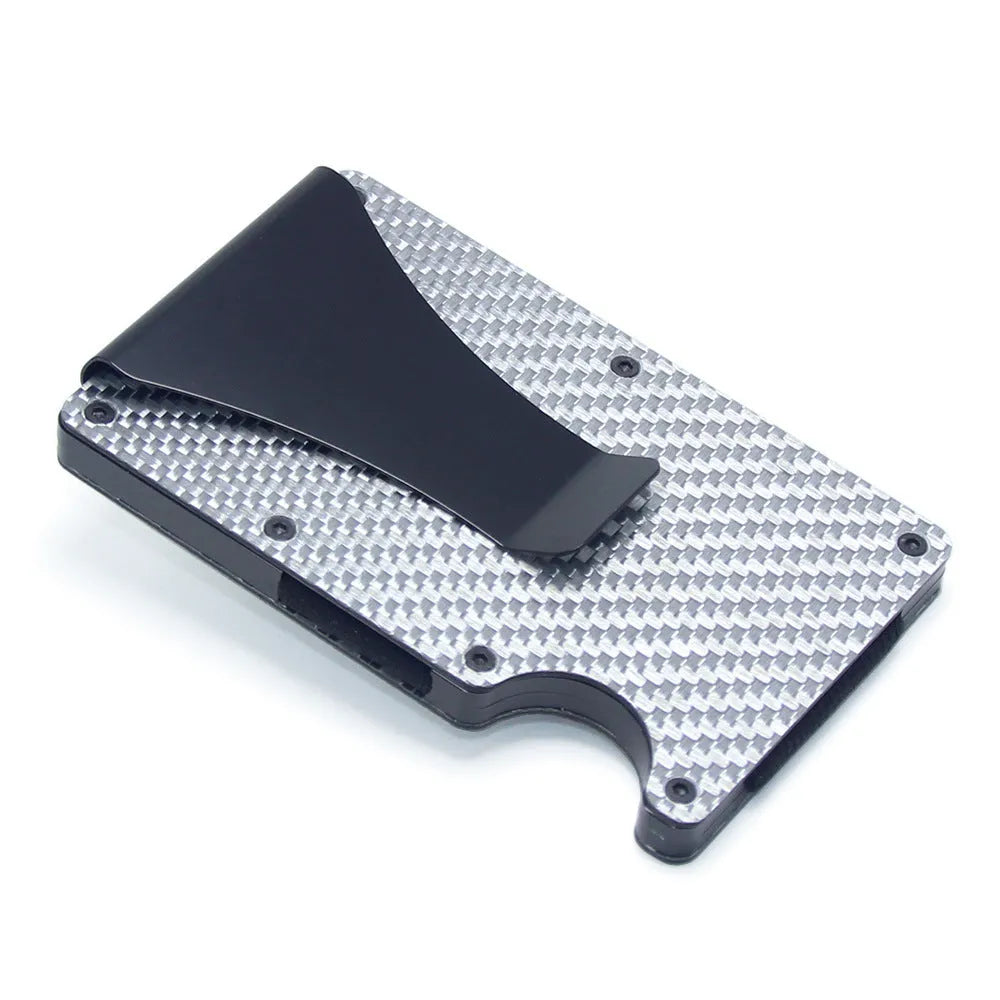Carbon fibre geometric wallet card holder showing 8mm thickness holding multiple bank cards