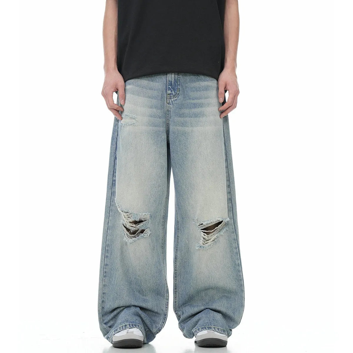 Blue straight-leg men's jeans with a zipper fly on a plain background.