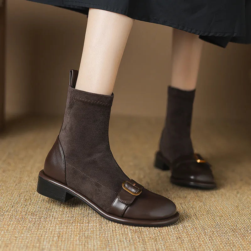 Women's black casual ankle boots with lace-up front and low rubber heel