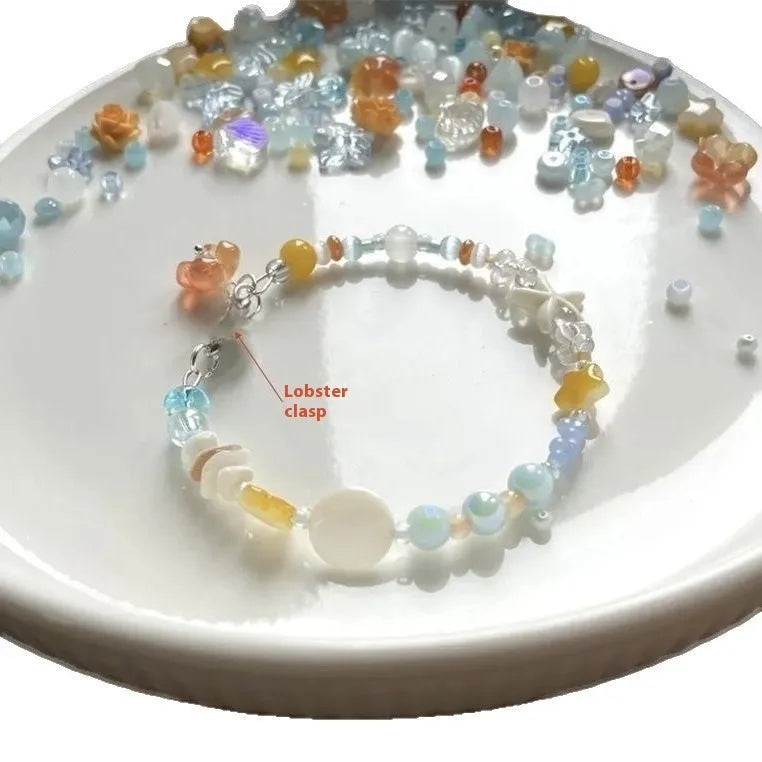 Orange seaside summer bracelet with round diamond elements and mixed alloy material construction