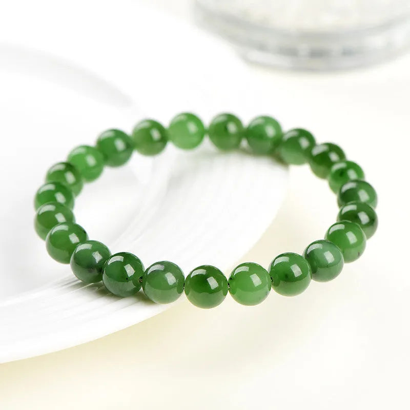 Natural jasper ball bracelet handcrafted from Hetian jade with polished stone beads