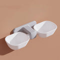 Automatic plastic pet feeder with double bowl and adjustable height, shown in white or yellow with one cat bowl
