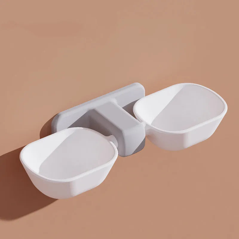 Automatic plastic pet feeder with double bowl and adjustable height, shown in white or yellow with one cat bowl