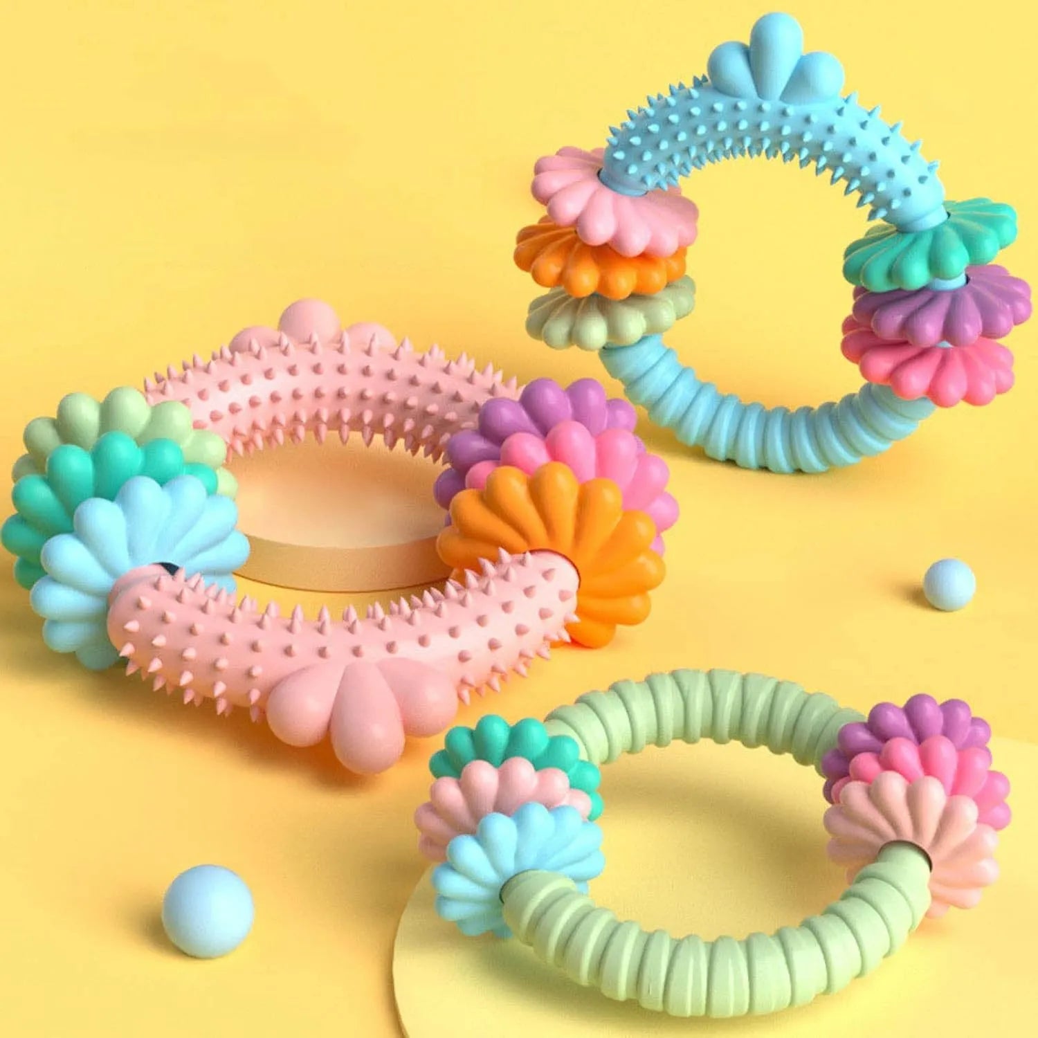 TPR dog chew toy with squeaker in blue, green, or pink colours for small dogs teeth cleaning