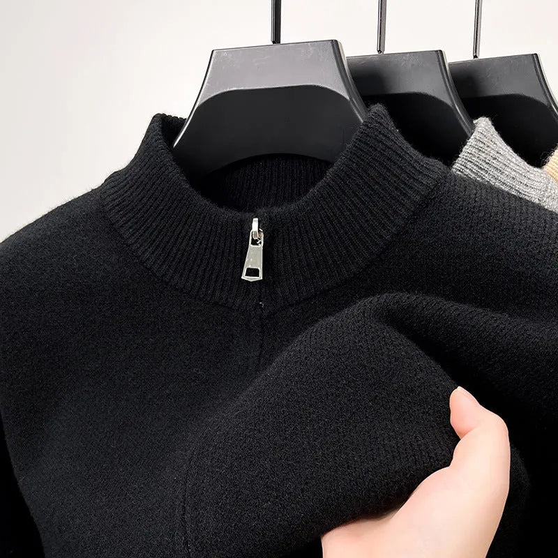 Men's black knitted zipper cardigan with stand collar showing front zip and loose fit