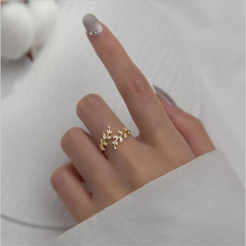 Women's copper electroplated leaf branch fashion ring in gold or silver geometric design