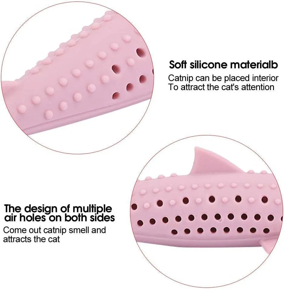 Green silicone fish-shaped cat chew toy with dental cleaning texture and side holes