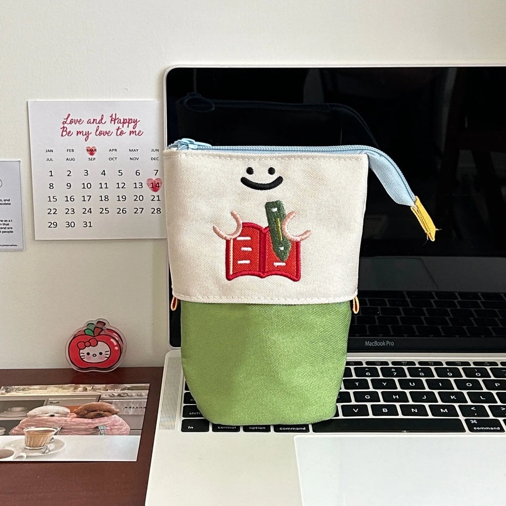 Cartoon design collapsible pencil case in Oxford fabric measuring 17cm by 14cm
