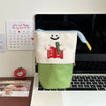 Cartoon design collapsible pencil case in Oxford fabric measuring 17cm by 14cm