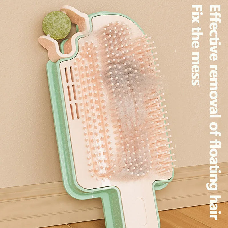 Ice cream cone shaped cat rubbing artifact with textured surfaces and feather attachment