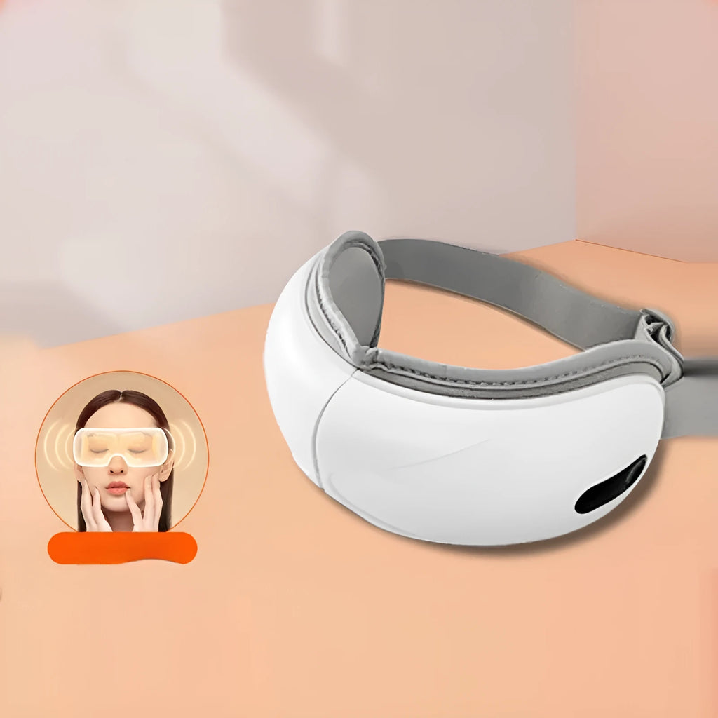 White rechargeable eye massager with airbag massage and hot compress functions for eye fatigue relief
