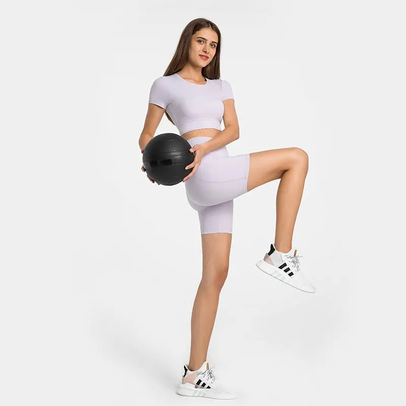 Women's solid colour cotton blend sports shorts with a super stretch waistband.
