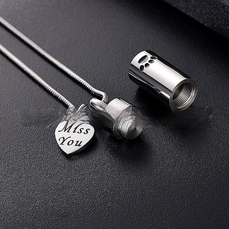 Silver cylindrical paw print ashes necklace with openable stainless steel memorial pendant