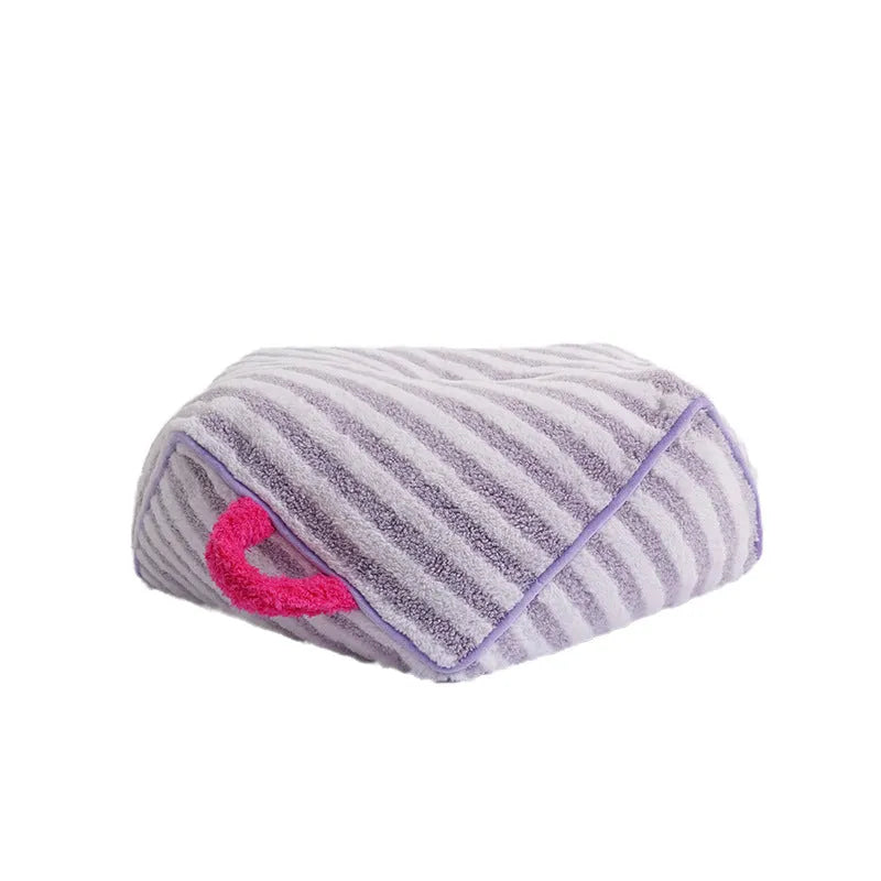 Striped soft velvet dog bed with a removable cover in orange, purple, or yellow colour options.