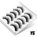 Box of natural style false eyelashes and glue, made from artificial fibre.