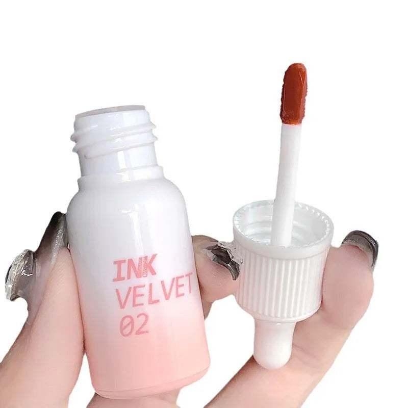 Mirror Lip Lacquer tube showing four shade options including Orange Tabby Cat Diary and Misty Berry