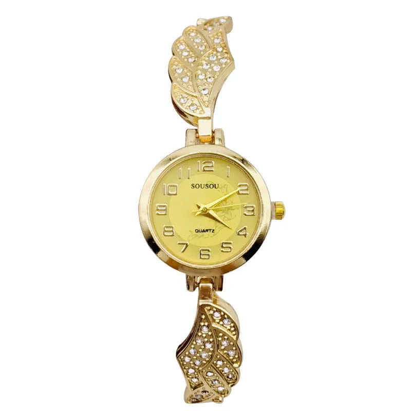 Women's stainless steel watch with round dial and vachette clasp, shown in gold colour.
