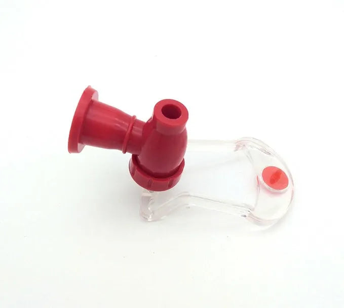 Red Magic Tap soda dispenser attached to inverted 2-litre bottle