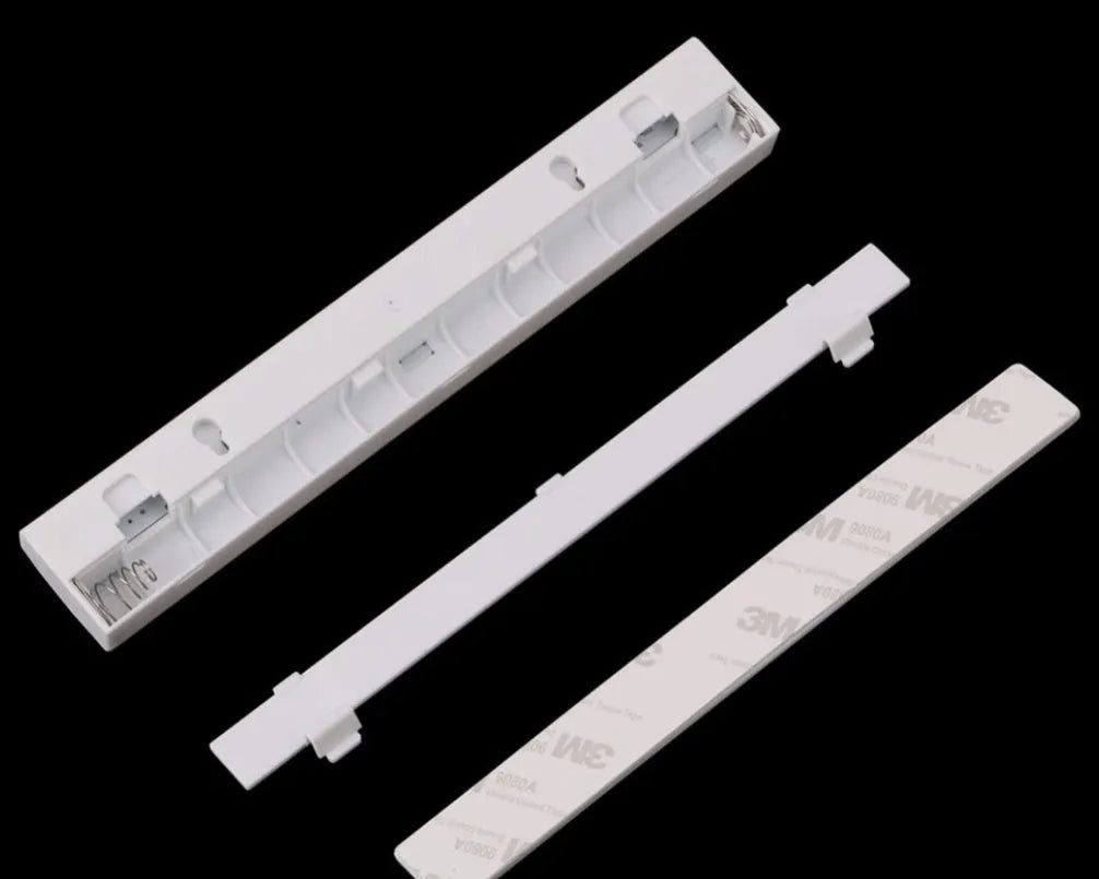 Magnetic LED closet light with motion sensor and aluminium shell shown mounted inside wardrobe