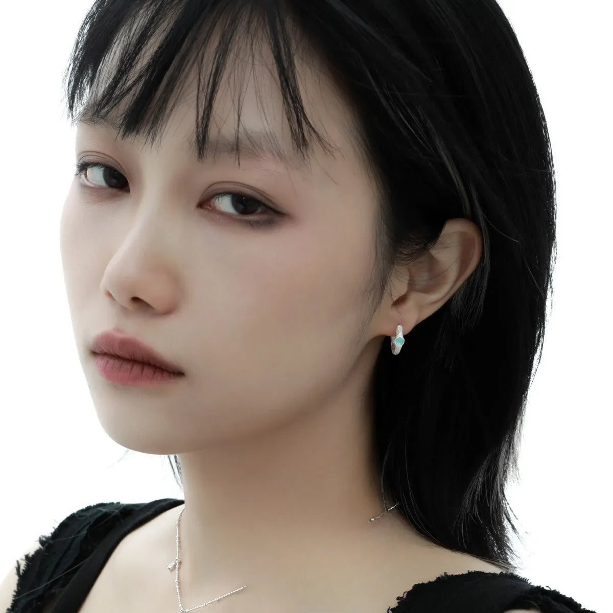 Women's burnt silver geometric ear clip made from 925 sterling silver.