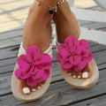 Women's plus size floral flip flop slippers in solid green colour, showing round toe shape