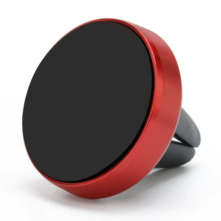 Magnetic car phone holder mounted on vehicle air vent in silver colour