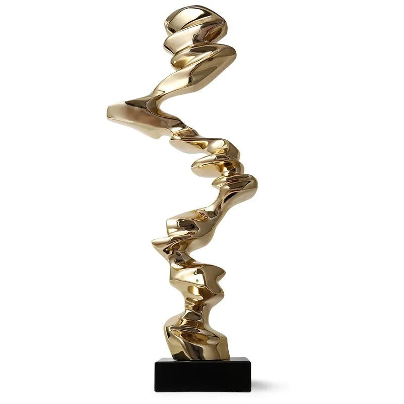 Modern abstract still life ornament in natural resin, shown in bright gold, elegant silver, and phantom blue finishes.