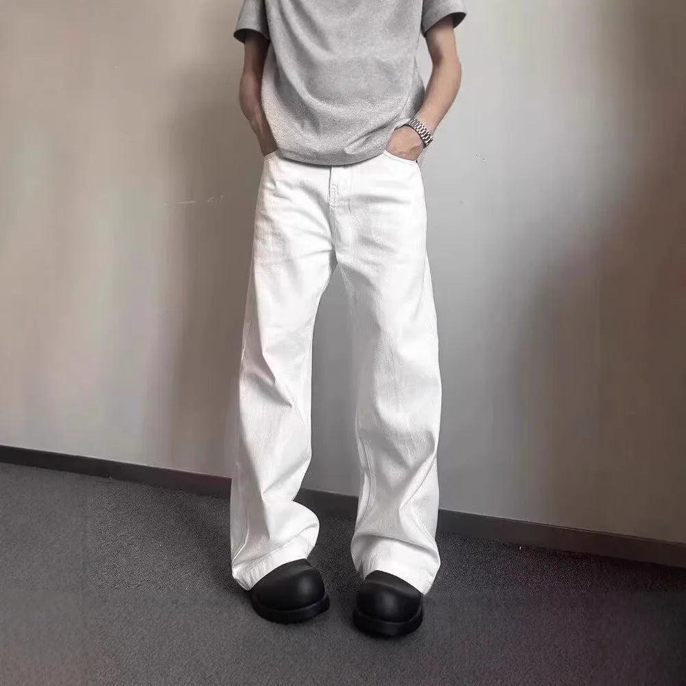 White straight-leg men's jeans with mid waist and zipper fly on mannequin