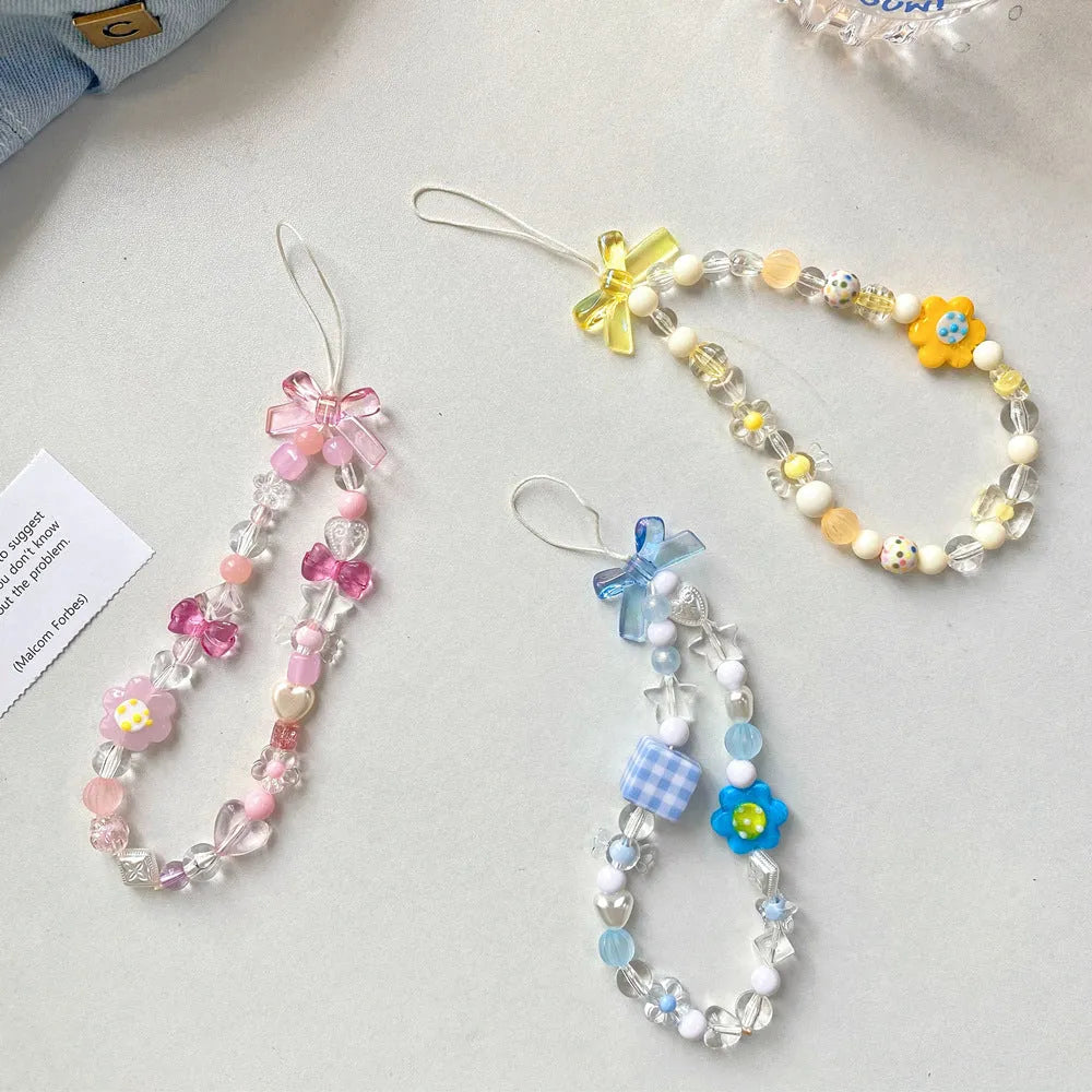 Flower bead mobile phone lanyard with hand rope in yellow, blue, and pink colour options