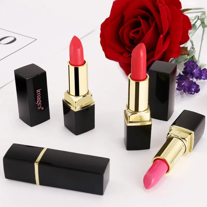 Moisturising lipstick lip gloss in a case showing colour range including coral red and pink.