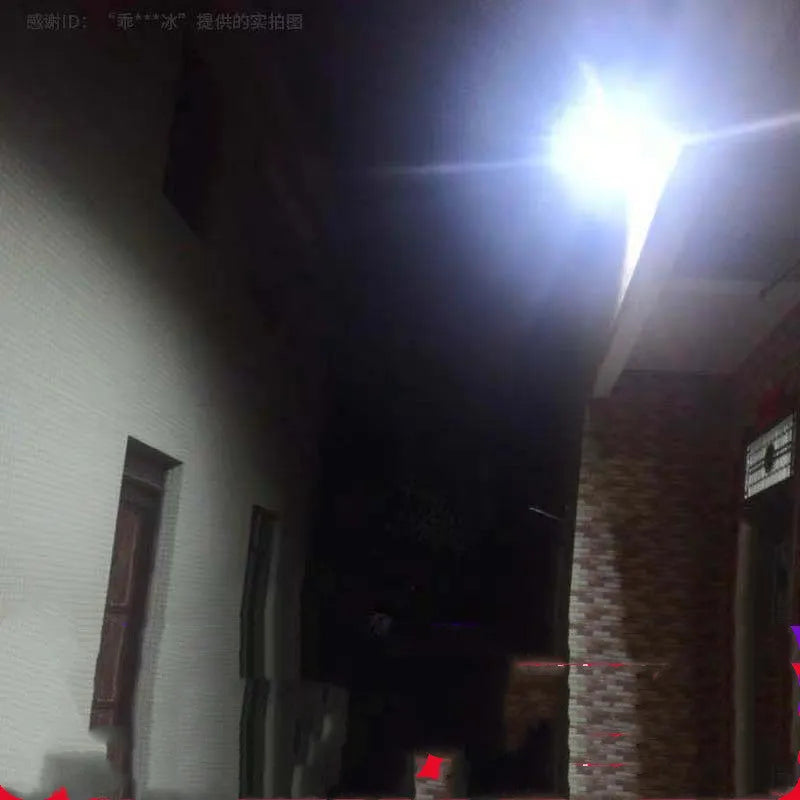 Black solar-powered LED flood light for outdoor garden use with remote control.