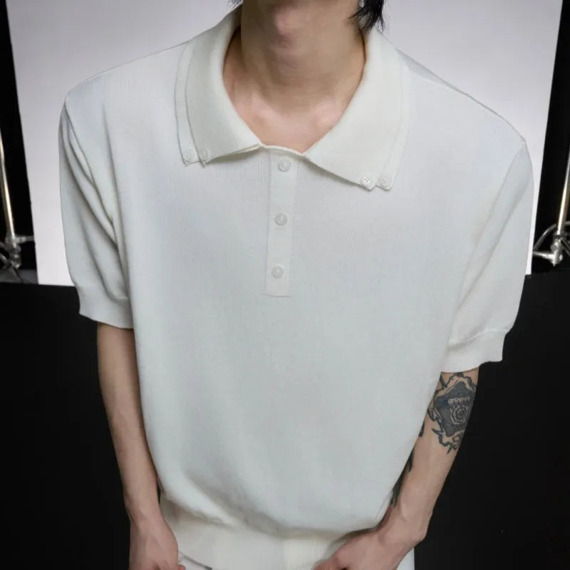 Man wearing a grey slim-fit short sleeve knit shirt with a double lapel collar design.