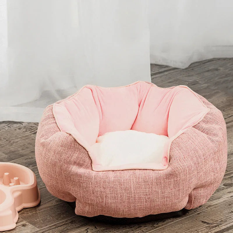 Blue octagonal pet bed with soft wool point design and removable mat for a small dog.