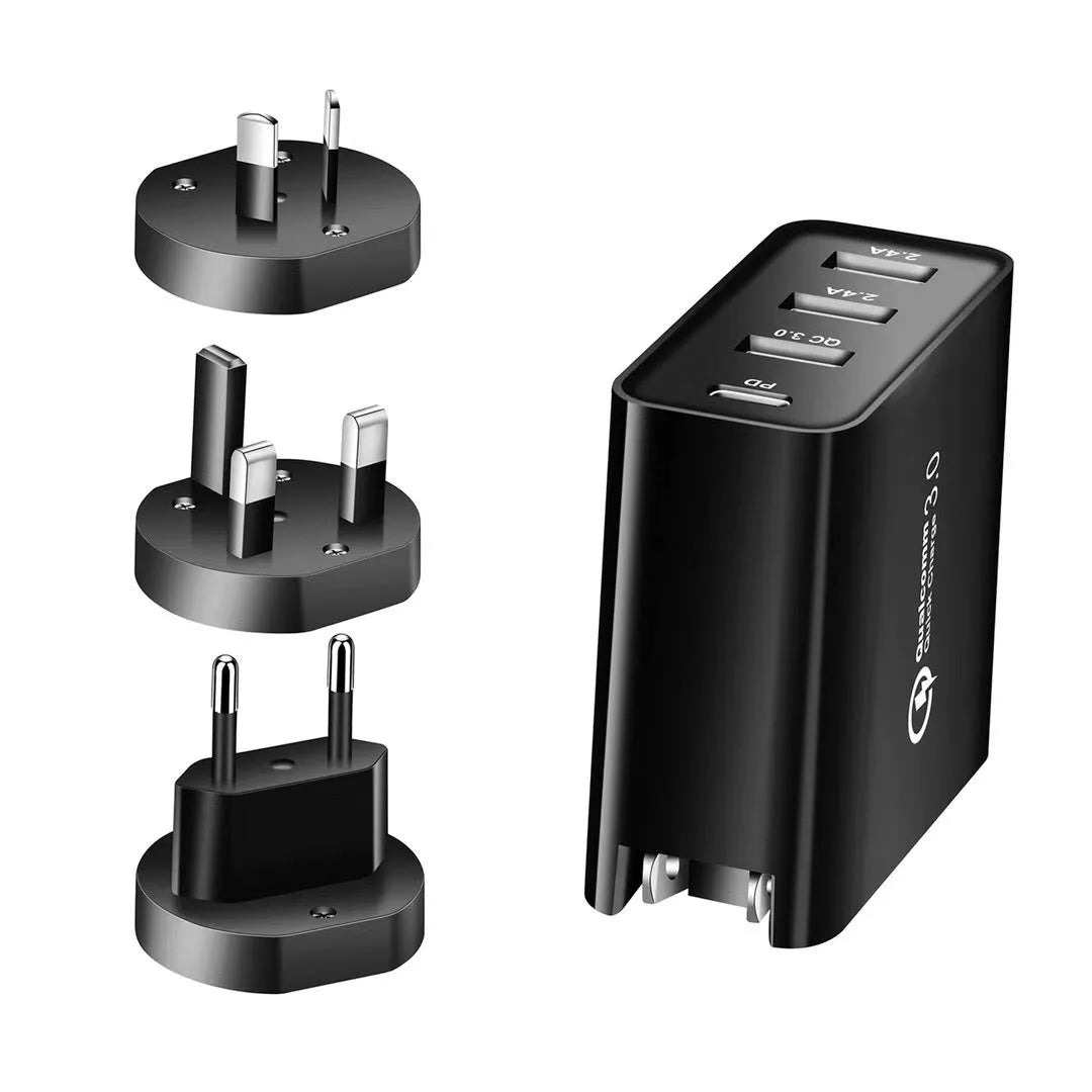 White 4-port fast wall charger with PD, QC, and USB ports on a table