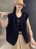 Women's loose-fitting polyester vest with side pockets in milky white colour