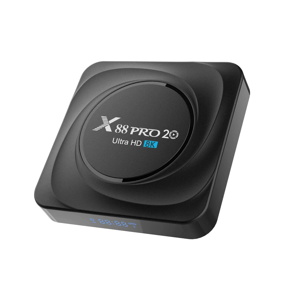 Compact black Android 11 TV box with HDMI port, remote control, and power supply on a wooden surface.