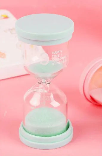 Glass sand timer with coloured sand in modern design showing timing duration options