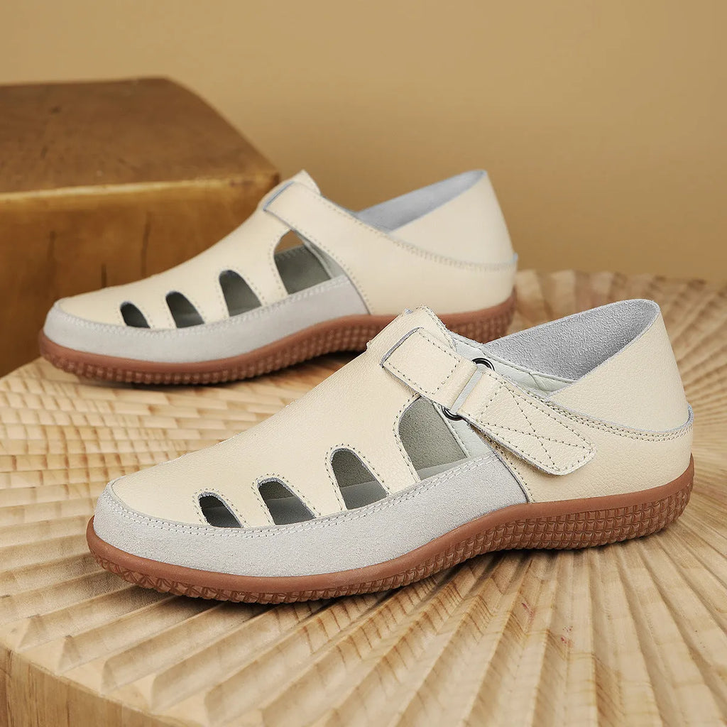 Plus size women's flat heel sandals with hollow breathable design and thick rubber sole