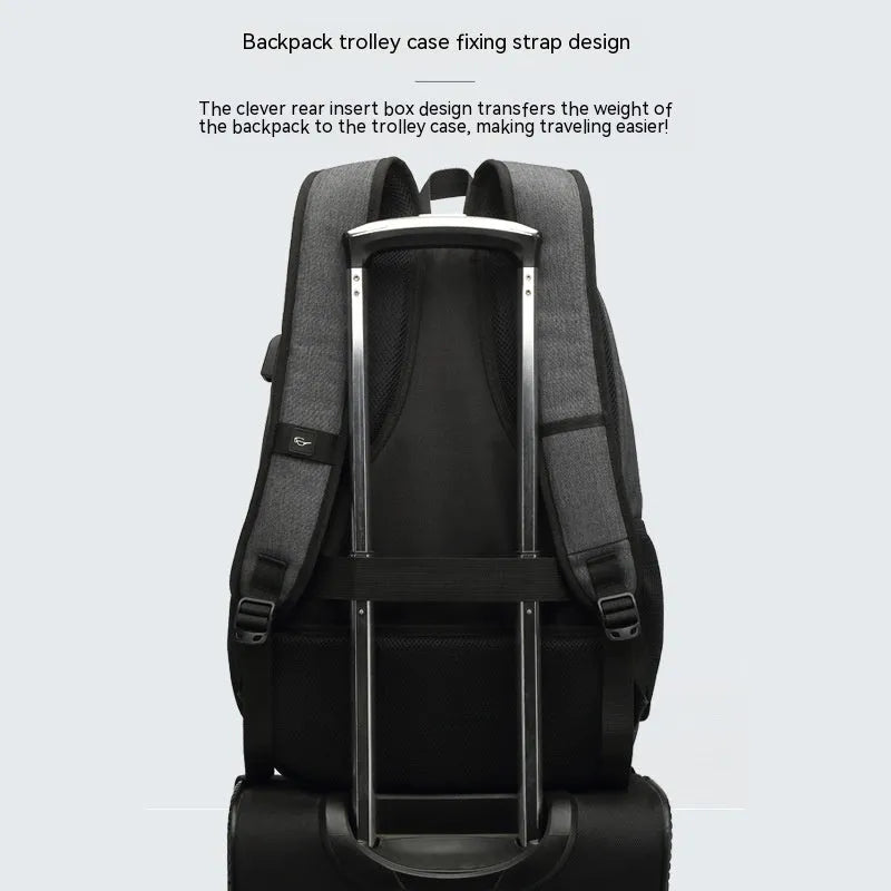 Grey lightweight backpack with USB charging port and trolley sleeve showing 32x15x46cm dimensions