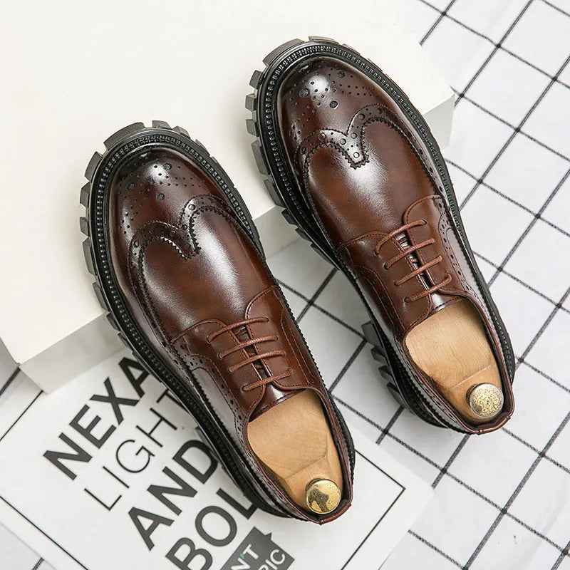 Men's black business brogue leather shoes with round toe design on white background