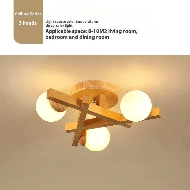 Wooden style circular ceiling lamp with three pendant lights in a Nordic design