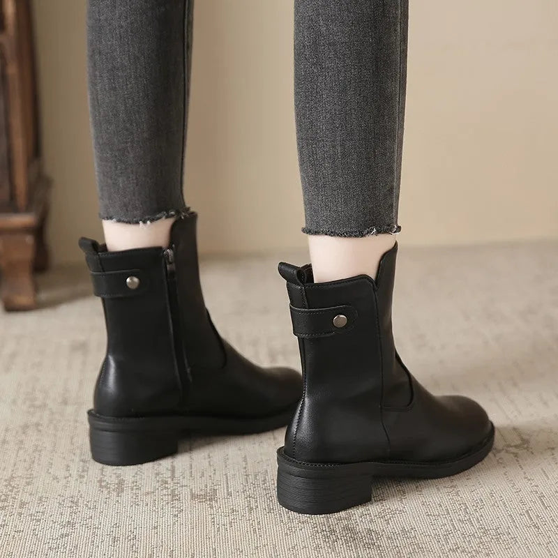 Black women's short boots with side zipper and low heel