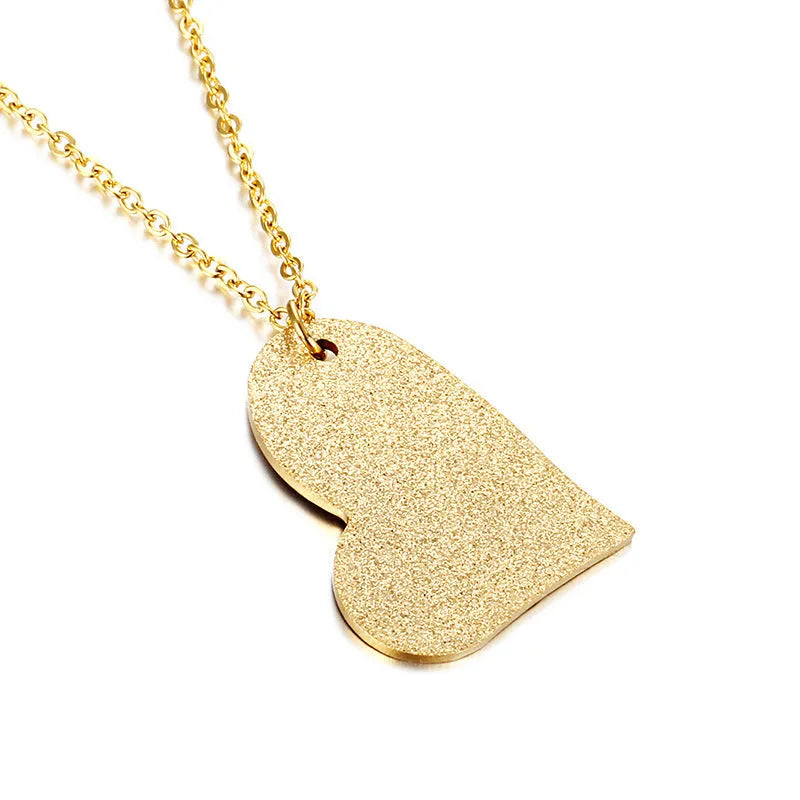Geometric heart-shaped titanium steel pendant necklace on model, simple fashion style
