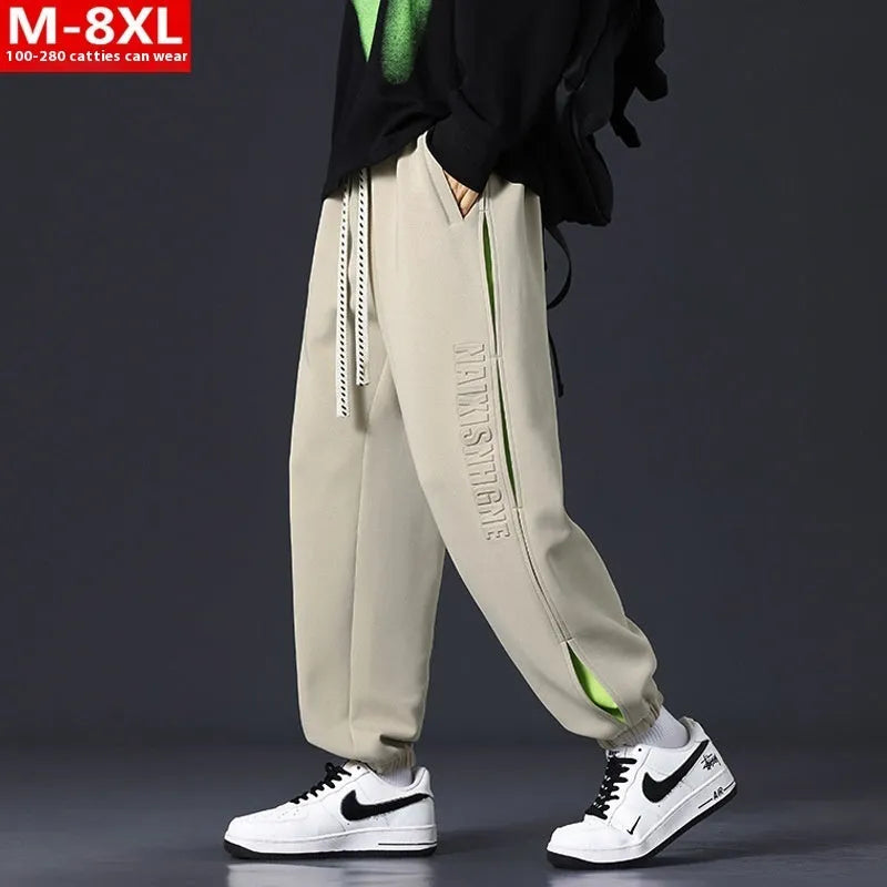 Men's loose cotton trousers with stitching printing design and ankle banded cuffs in black colour