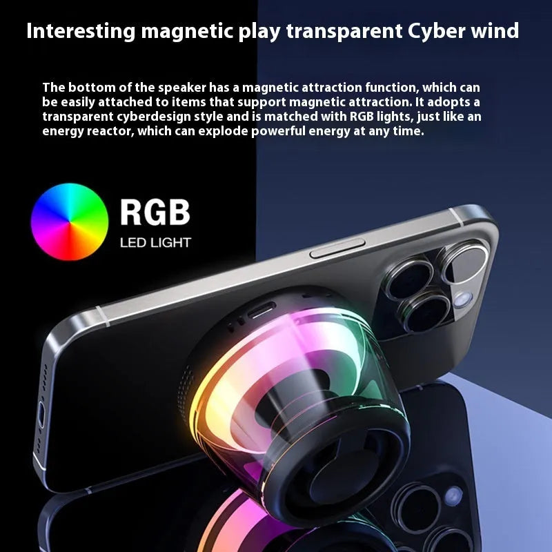 White portable Bluetooth speaker with magnetic base and ambient light on a metal surface.